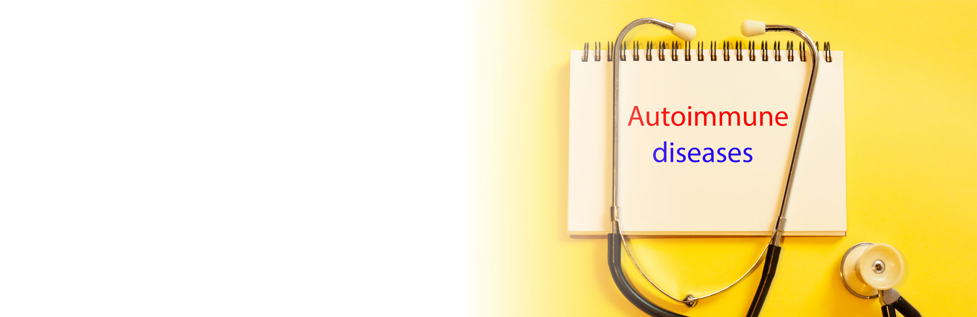 a stethoscope hangs over a notepad with the words 
